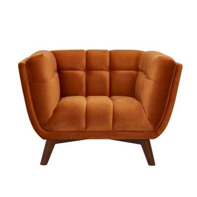 Fauteuil en velours orange curcuma