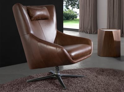 Fauteuil pivotant en cuir brun cognac