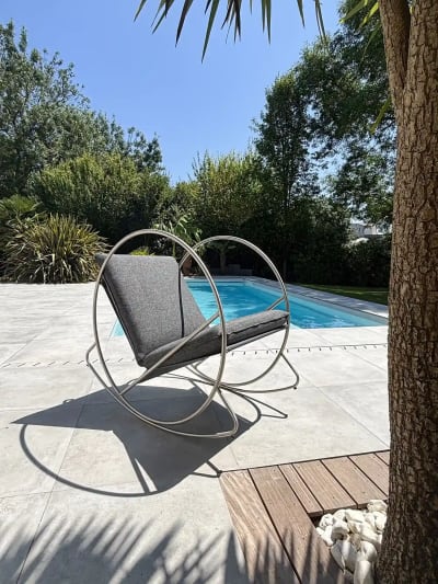Fauteuil à bascule de jardin en inox et toile plastifiée