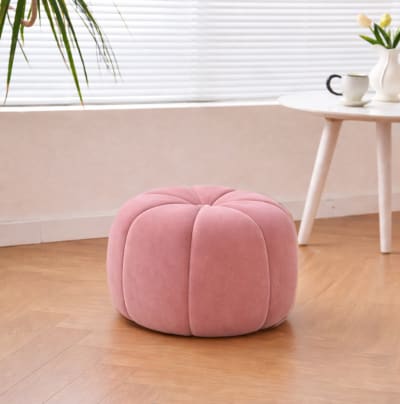 Pouf en velours rose avec rayures