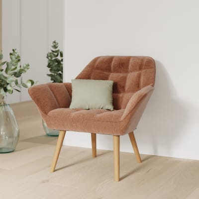Fauteuil en tissu rouge ancien