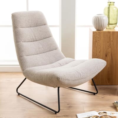 Fauteuil lounge en tissu bouclette beige