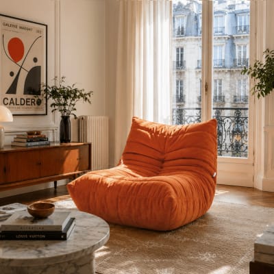 Pouf chauffeuse compressée en tissu chenille orange