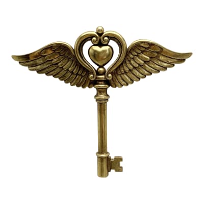 Déco murale clé ailes coeur 20x17cm dore