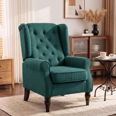 Fauteuil de salon capitonné assise large pieds en bois vert
