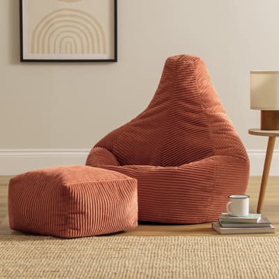 Pouf poire à dossier haut et repose-pied velours côtelé orange