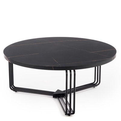 Table basse ronde avec plateau aspect marbre noir